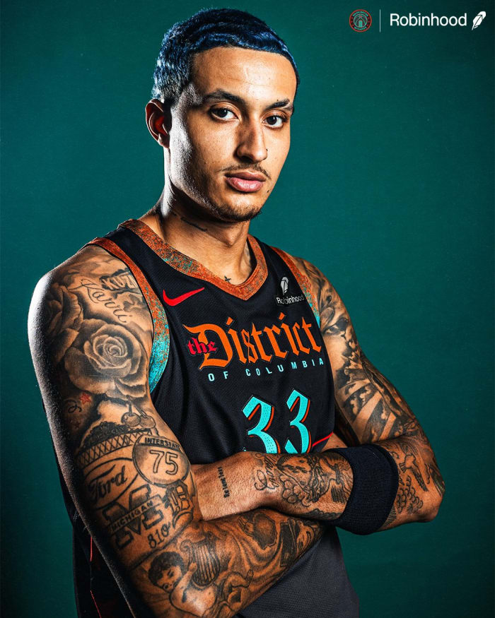 Kyle Kuzma poses in new 2023 Washington Wizards City Edition Uniforms